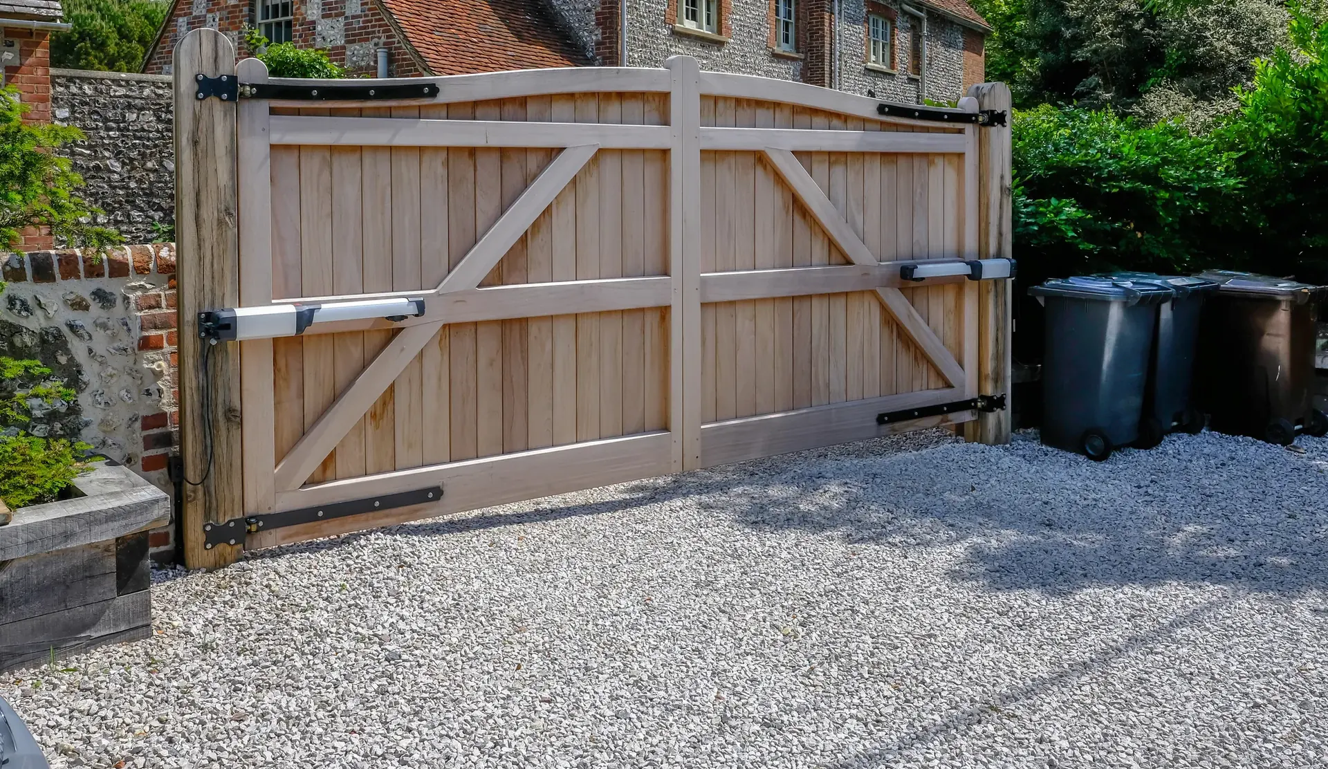 Timber swing gates fitted with automatic gate openers